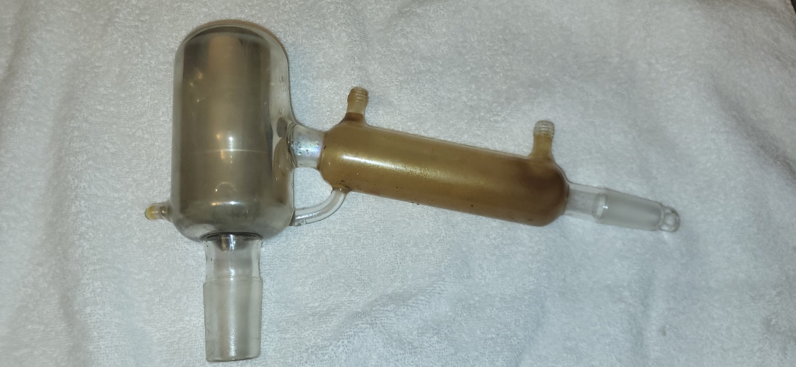 34/45 short path distillation head silver fumed with a summit research shelf.