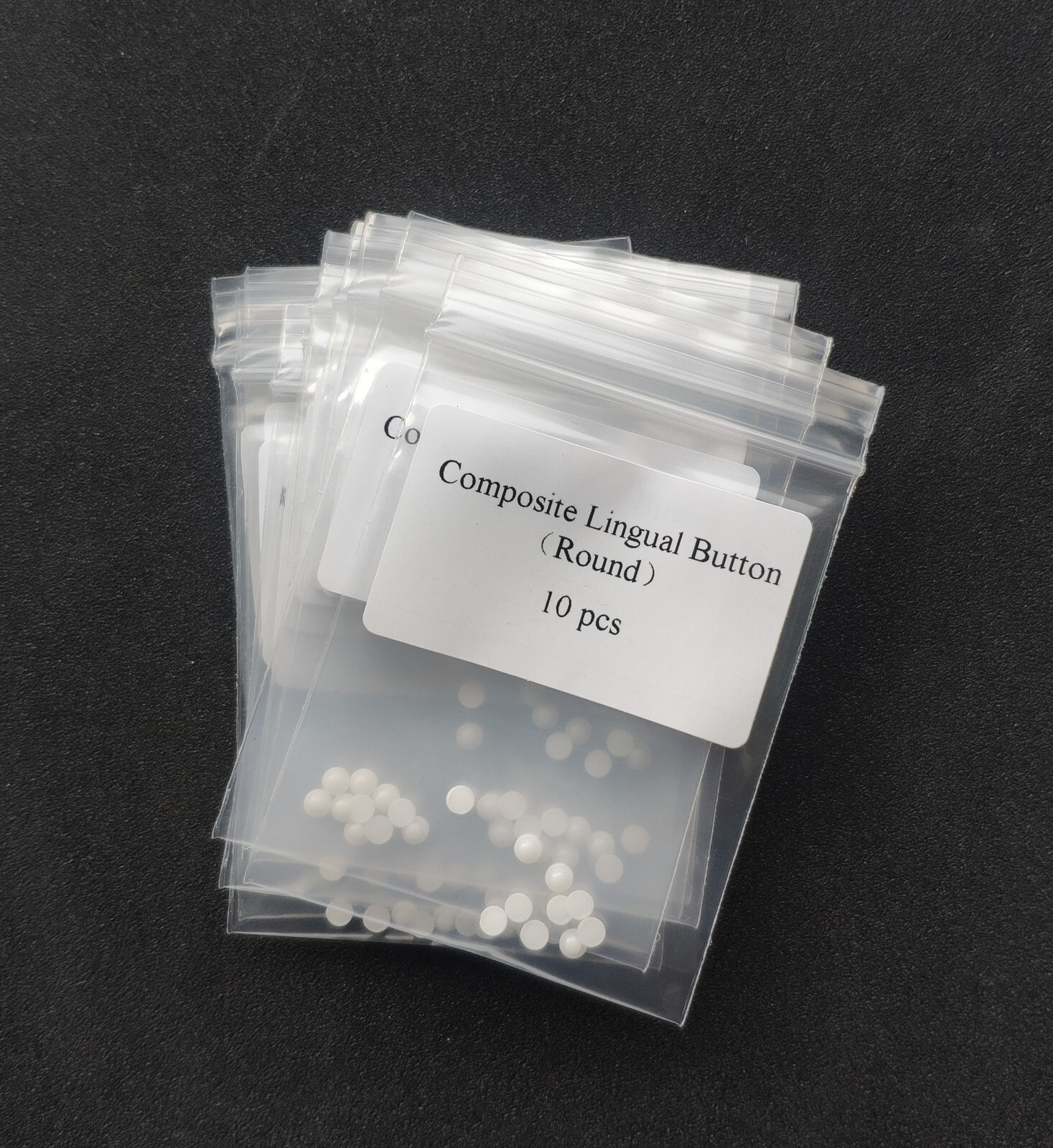 Dental Orthodontic Ceramic Lingual Buttons Bondable Round Mesh Base