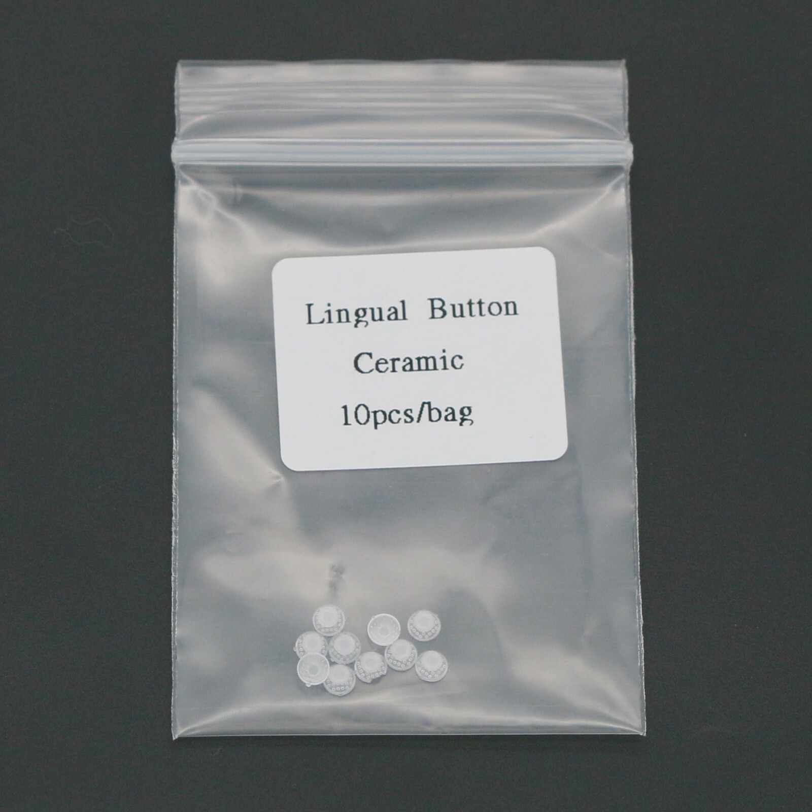 US 100 Pcs Dental Orthodontic Ceramic Lingual Button Bondable Round Base Clear