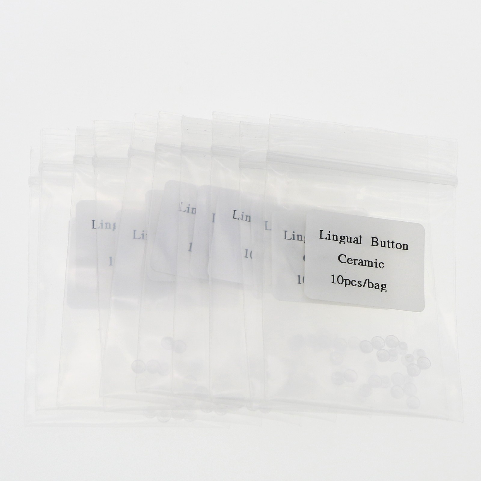 US 100Pcs/Pack Dental Ortho Ceramic Clear Lingual Buttons Bondable Round Base