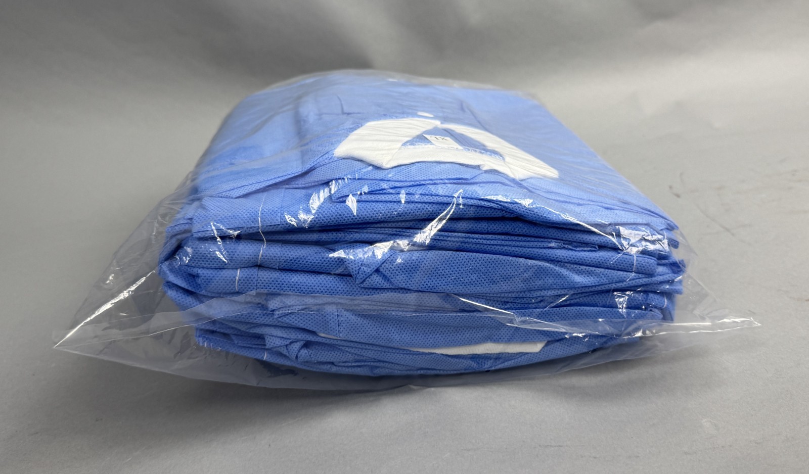 LOT OF 40 ULINE S-42018BLU-X DISPOSABLE LAB COATS: blue, unisex, XL|010-9278029