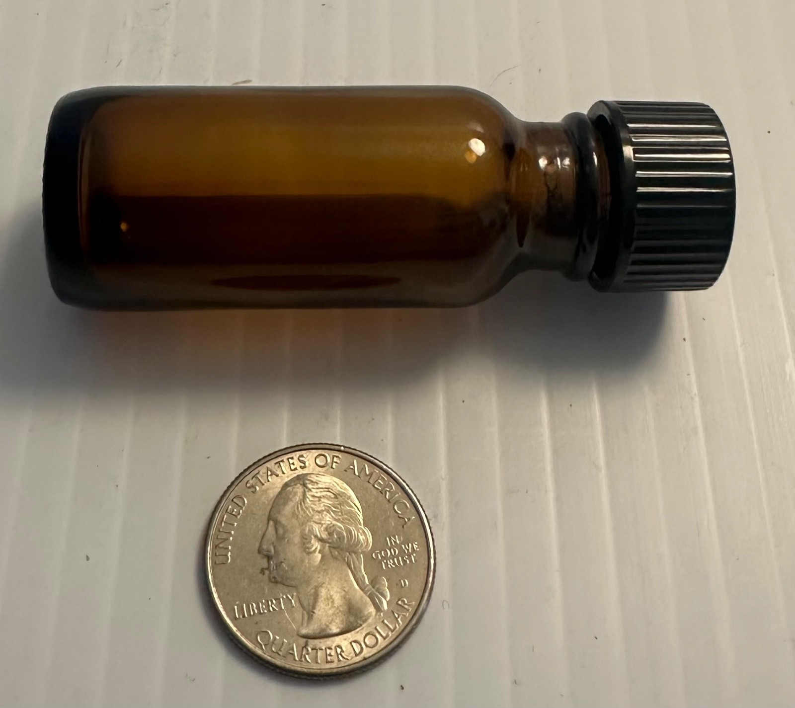 Boston Round 1/2 oz Amber Glass Bottles With Poly Lined Black Caps