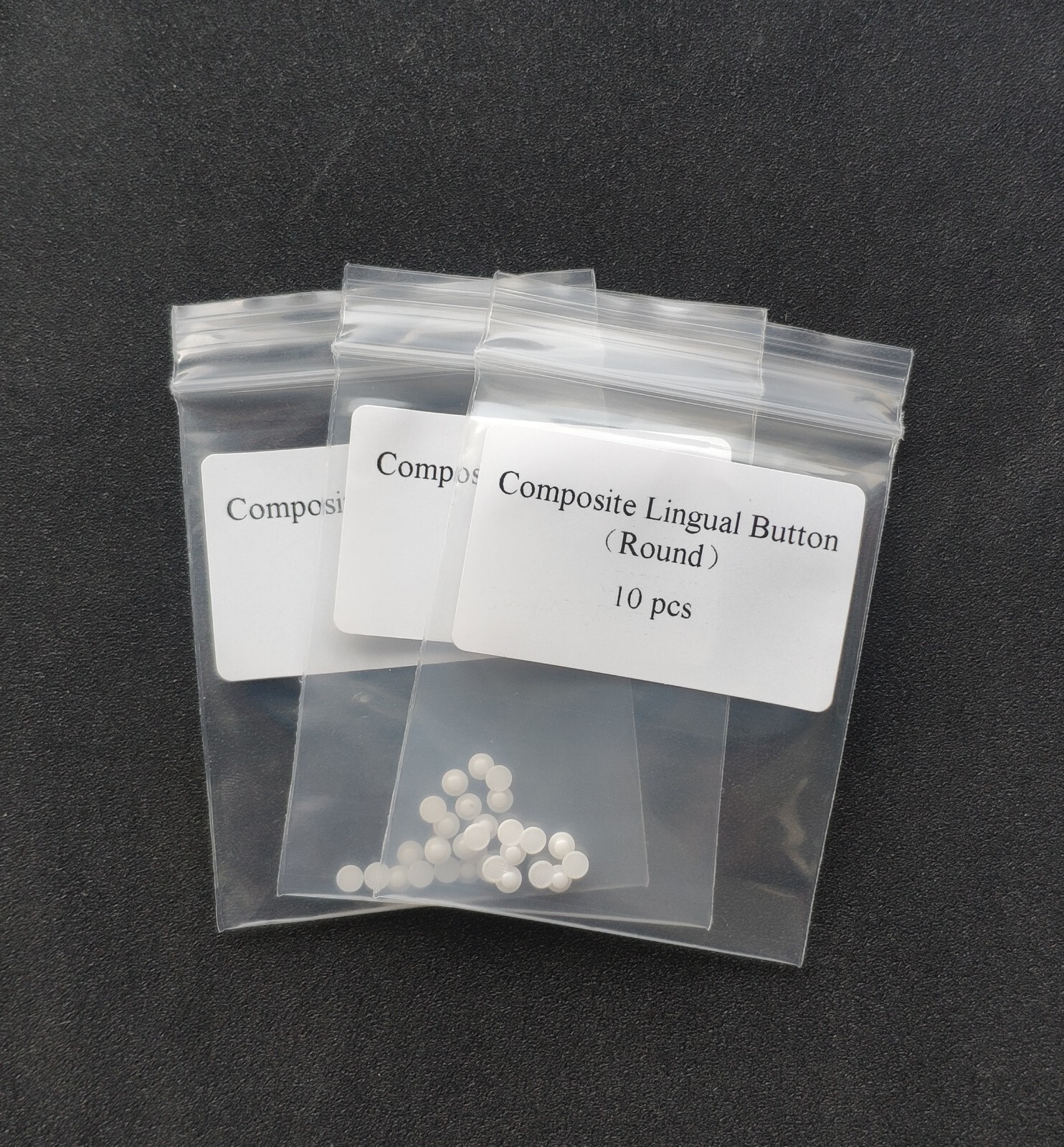 Dental Orthodontic Ceramic Lingual Buttons Bondable Round Mesh Base
