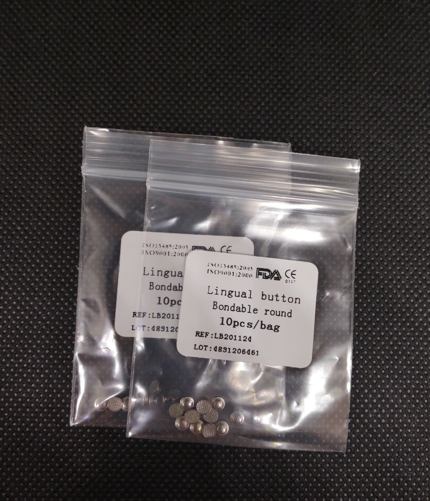 100 Pieces Dental Orthodontic Lingual Buttons Round Mesh Base Orthodontic