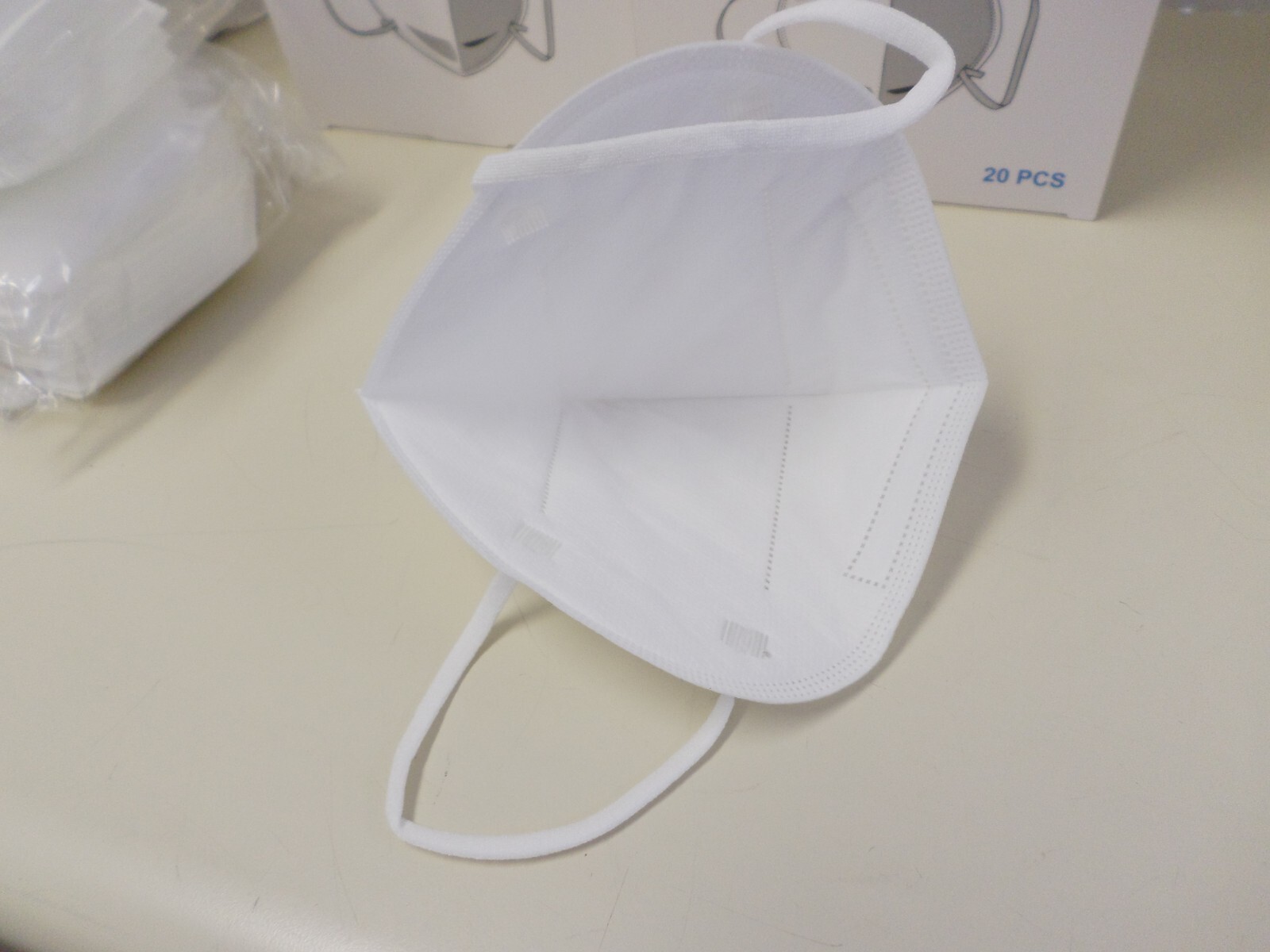 1200 KN95 White Face Mask Disposable 5 Layers. The best Price = $1 for 10 PCs