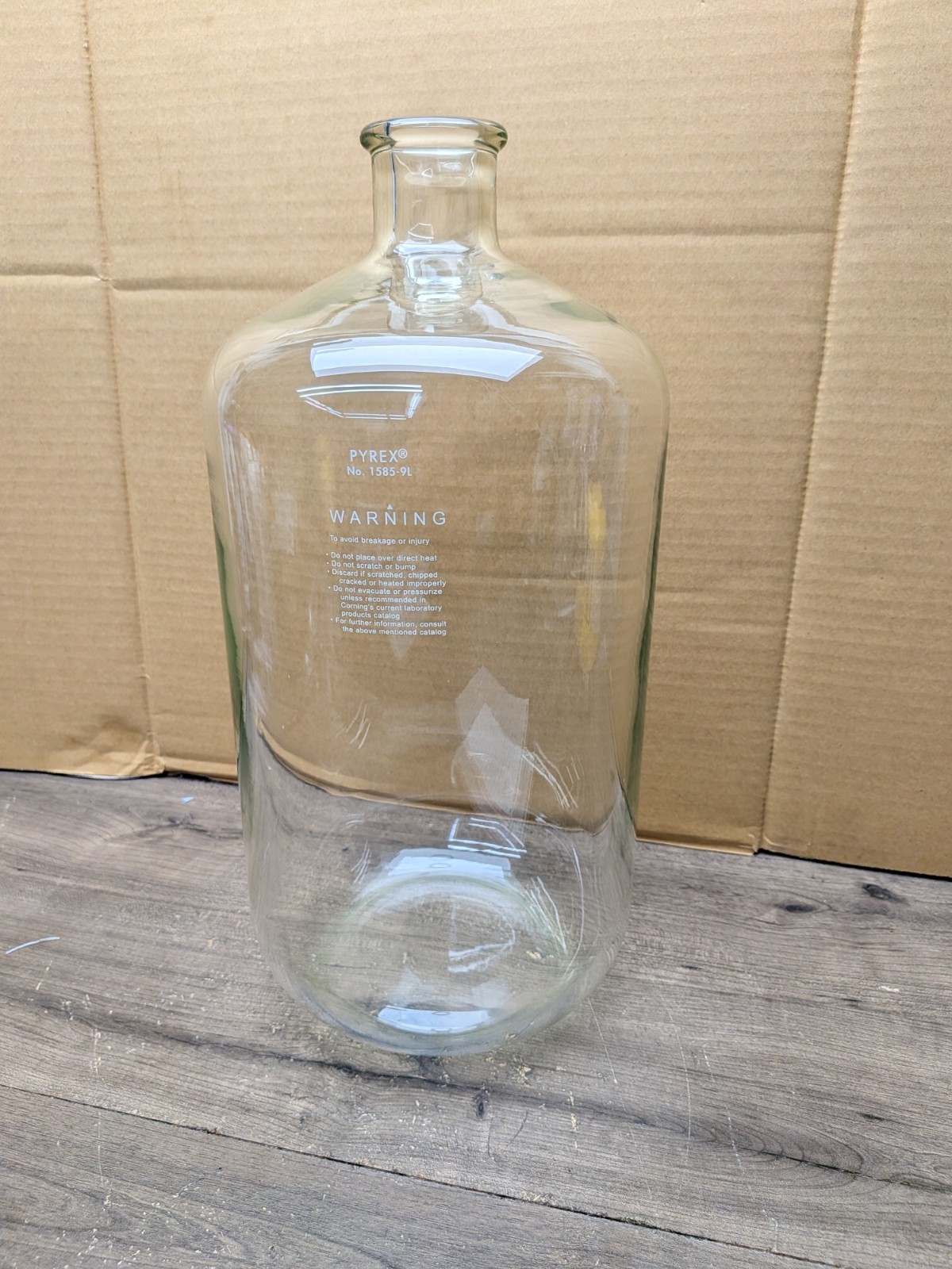 NOS PYREX 1585-9L is a heavy-wall, 9-liter borosilicate glass serum bottle