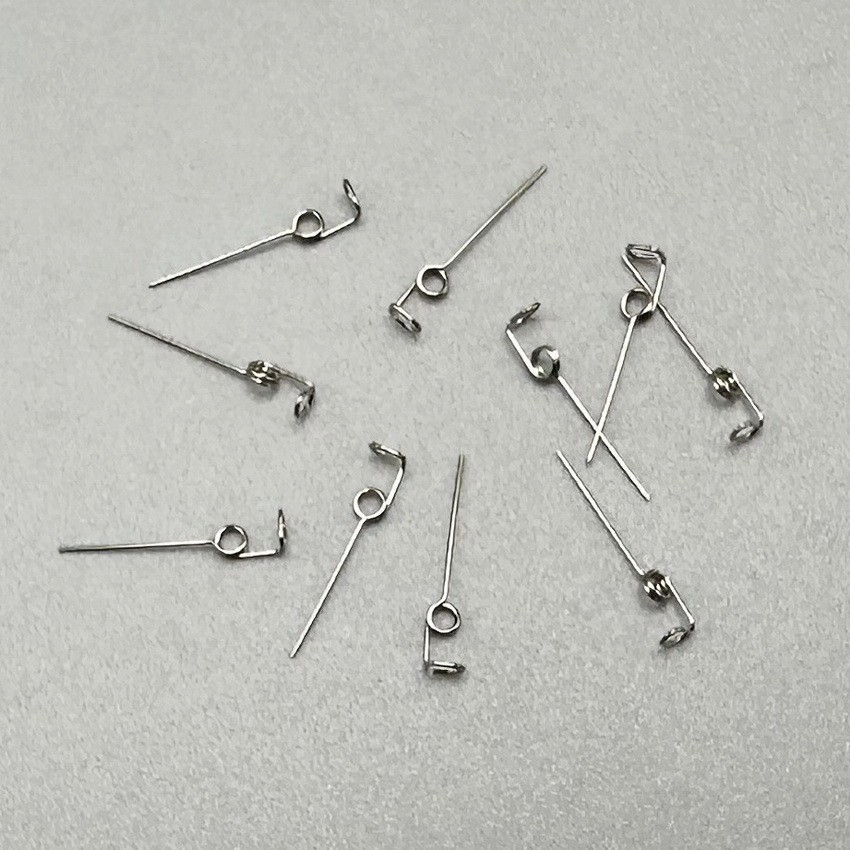 10pcs/bag Dental Orthodontic Wire Spring Rotate Teeth Uprighting Wires CW/CCW