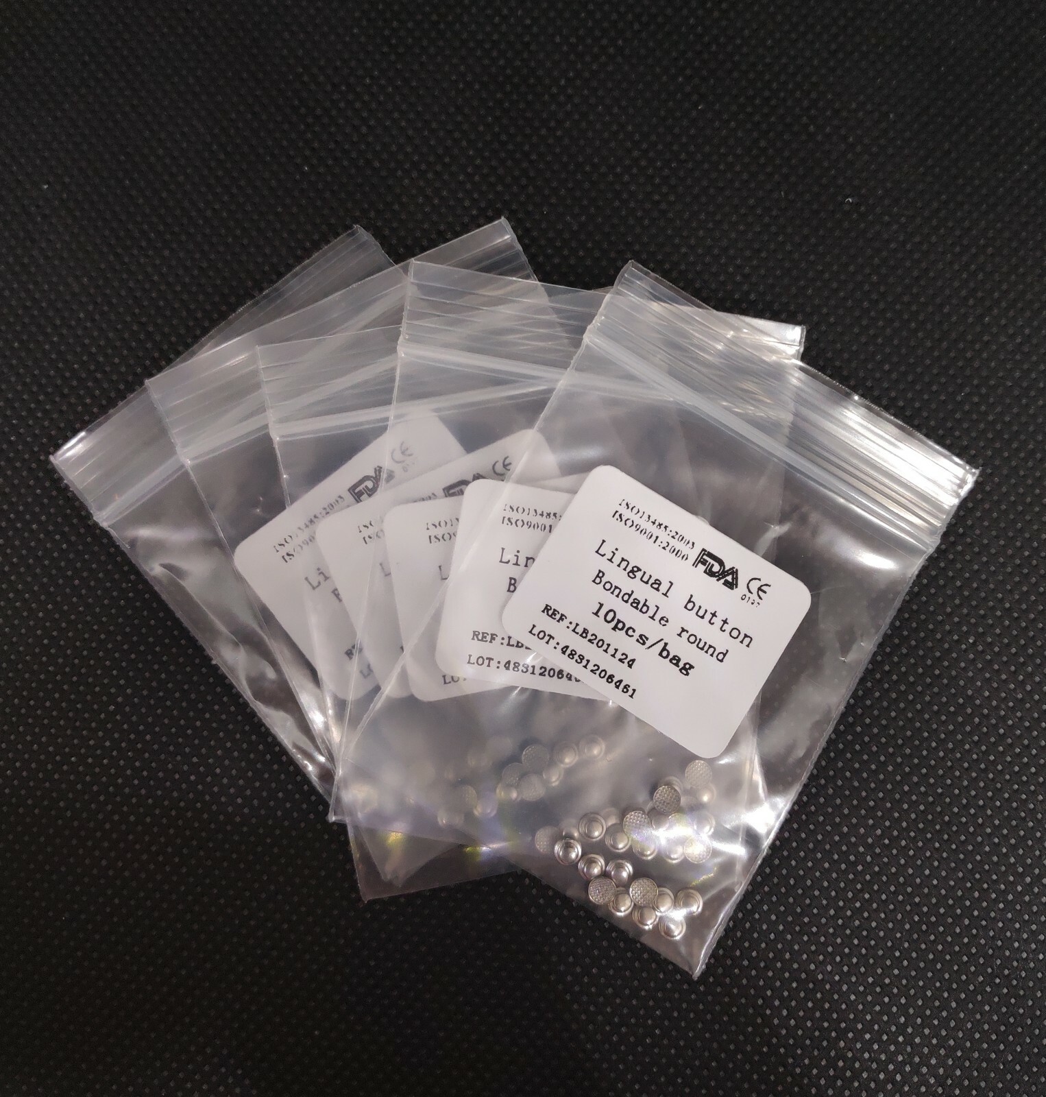 100 Pieces Dental Orthodontic Lingual Buttons Round Mesh Base Orthodontic
